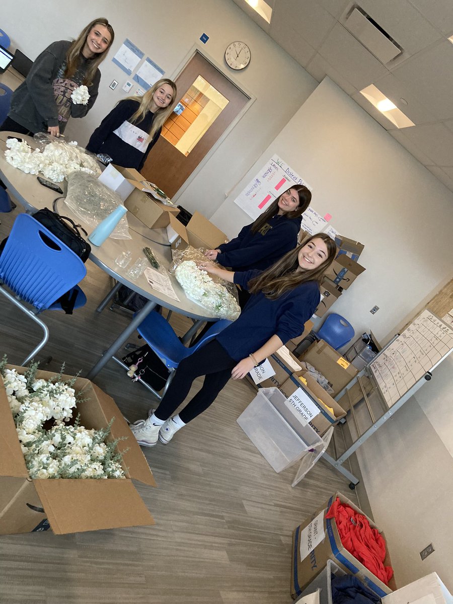 Prom prep is underway!   All hands on deck putting together centerpieces and making the senior t-shirts!   See you this Friday seniors !! 💙