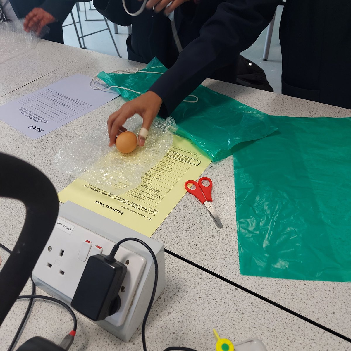 MA_ScienceDept's tweet photo. The start of #Engineering elective at MA today - Mr Islam is having us construct parachutes for eggs!

Will they smash it? Or crack under the pressure...? 🥚 https://t.co/sIyh5RnqXT