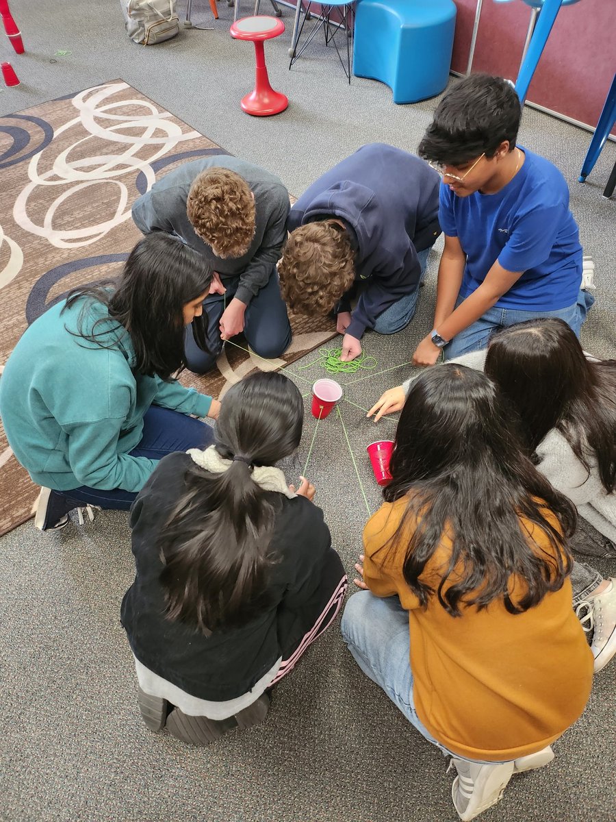 Matthews_MOMS's tweet photo. G&amp;T Ss collaborated to solve a STEAM challenge on no tech Tuesday. Here is a septagon: 7 innovators, using nothing but string, a rubber band,and teamwork to make a cup flip. #teamwork @kramer_MOMS @AsstSuptMOTSD @mtolivemiddle @MountOliveTSD https://t.co/q940v1tWrD