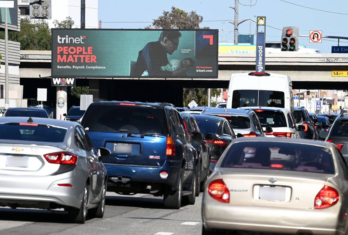 TriNet's tweet photo. They say nobody walks in L.A. So we made sure you could catch us in your car! Check us out all around freeways & intersections throughout La La Land. Where have you seen #IncredibleHR?
#YourPeopleMatter #OOH #advertising #NewBrand #TriNetCustomers #LAtraffic #adcampaign https://t.co/vKeiku2KzZ