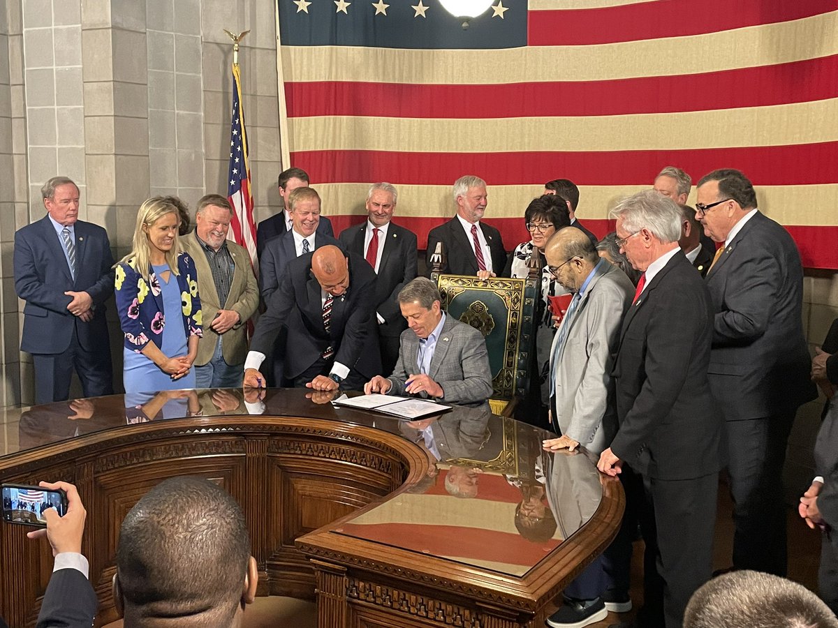 ErinBamer's tweet photo. Gov. @TeamPillen just signed #LB77, the permitless concealed carry bill, into law. It won’t take effect until 90 days after the end of this #neleg session, around late August early September. https://t.co/DDrYbQ1R0B