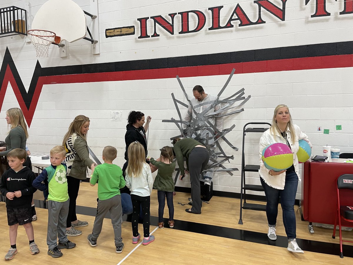 Cusd25's tweet photo. Duct taping Mr Borries &amp; Mr Grubaugh to the gym wall ⁦@JhNcelem⁩ assembly #WaytoGoIndians #NCFun https://t.co/9D6YBvtSKB