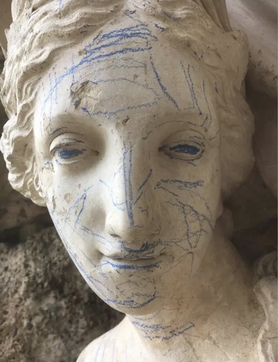 A group of English school kids doodled on a 200 year old statue with crayons and it's kind of amazing.