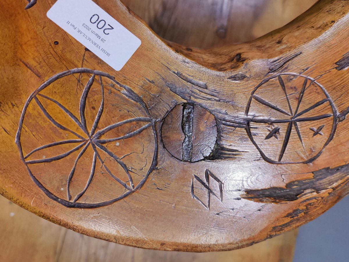 ClaudiaKinmont1's tweet image. Great that National Museum  @NMIreland acquired this rare birthing stool, with characteristically Irish splayed &amp;amp; thru-wedged legs, &amp;amp; u-shaped 'natural knee' seat (precisely like earlier Birth stools). Protective Hex, Witch or Apotropaic marks include Daisy wheels &amp;amp; sacred heart.