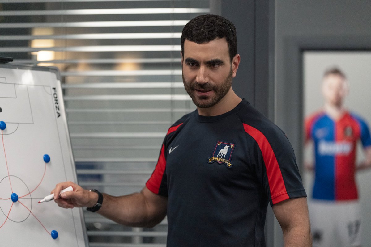 brettgoldstein's tweet photo. Ted Lasso Episode 7 is out now on @AppleTV and it's written by Jane herself, the genius @phoebewalsh_ and it's a banger. No spoilers but judging by these pics, Roy takes his dog for a run, Roy, Beard and Ted try to play Sit, Lie, Stand and Roy gets spider's bum in Pictionary. https://t.co/DMIROkBdXM