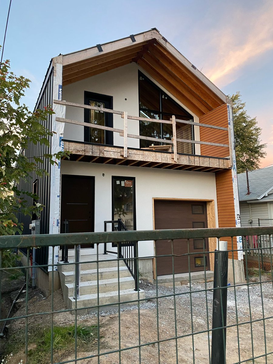 AdamAHawkswell's tweet photo. #CBDuplex stucco complete, exterior doors set and soffit beginning. https://t.co/GVL5i5FI9Q