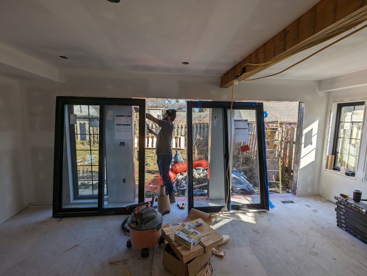 AdamAHawkswell's tweet photo. #AirBnBCrystalBeach board beginning to be hung and taped. Exterior patio doors were delivered and set. https://t.co/Vk8MY44chR