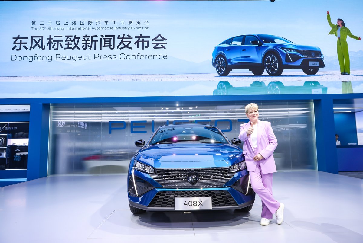 PeugeotNZ's tweet photo. Our CEO @LindaJackson was there to greet the #ShanghaiMotorShow visitors and introduce them to #Peugeot408X and #PeugeotInceptionConcept. https://t.co/vgwwDTedFY