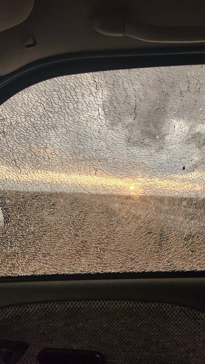 CorbinVogesWX's tweet photo. Window busted from the Rear flank downdraft of this Kress storm. Guy in front of me clocked a 104mph wind gust with his anemometer while we were parked. #txwx #phwx #extremewinds @StormSearch7 @ABC7Amarillo @joepumawx @natwxdesk @NWSLubbock https://t.co/B1GZDS3Dsv