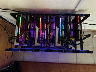 Fatzjam2017's tweet photo. there is another mining  rack. It as 13 5700XT. https://t.co/KSJOrQva7y