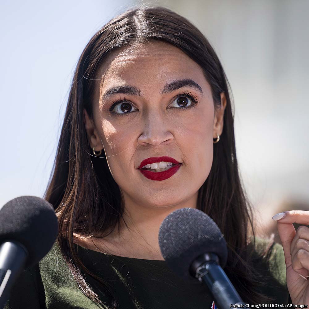 NEWSMAX's tweet photo. Rep. Alexandria Ocasio-Cortez celebrated the firing of Fox News host Tucker Carlson after his abrupt ousting was announced by the network Monday. https://t.co/5OBcC0S0Rn https://t.co/GP7JksUc1U