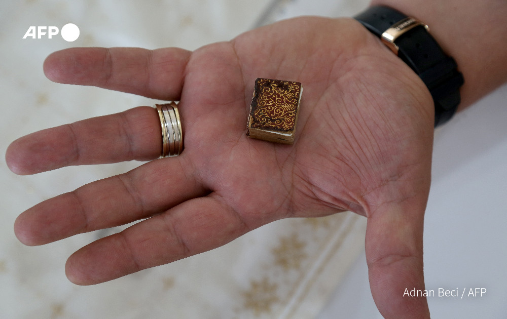 AFP's tweet photo. The big history of Albania's tiny Koran

https://t.co/iHAMlOeoEt https://t.co/qrPKD1qixP