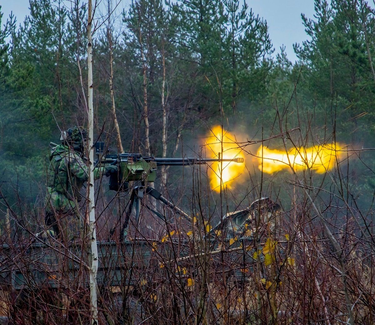 Finnish Air Force 'KarLsto' - conscript fires a 12.7mm NSV machine gun, during an exercise (Nov 2022)