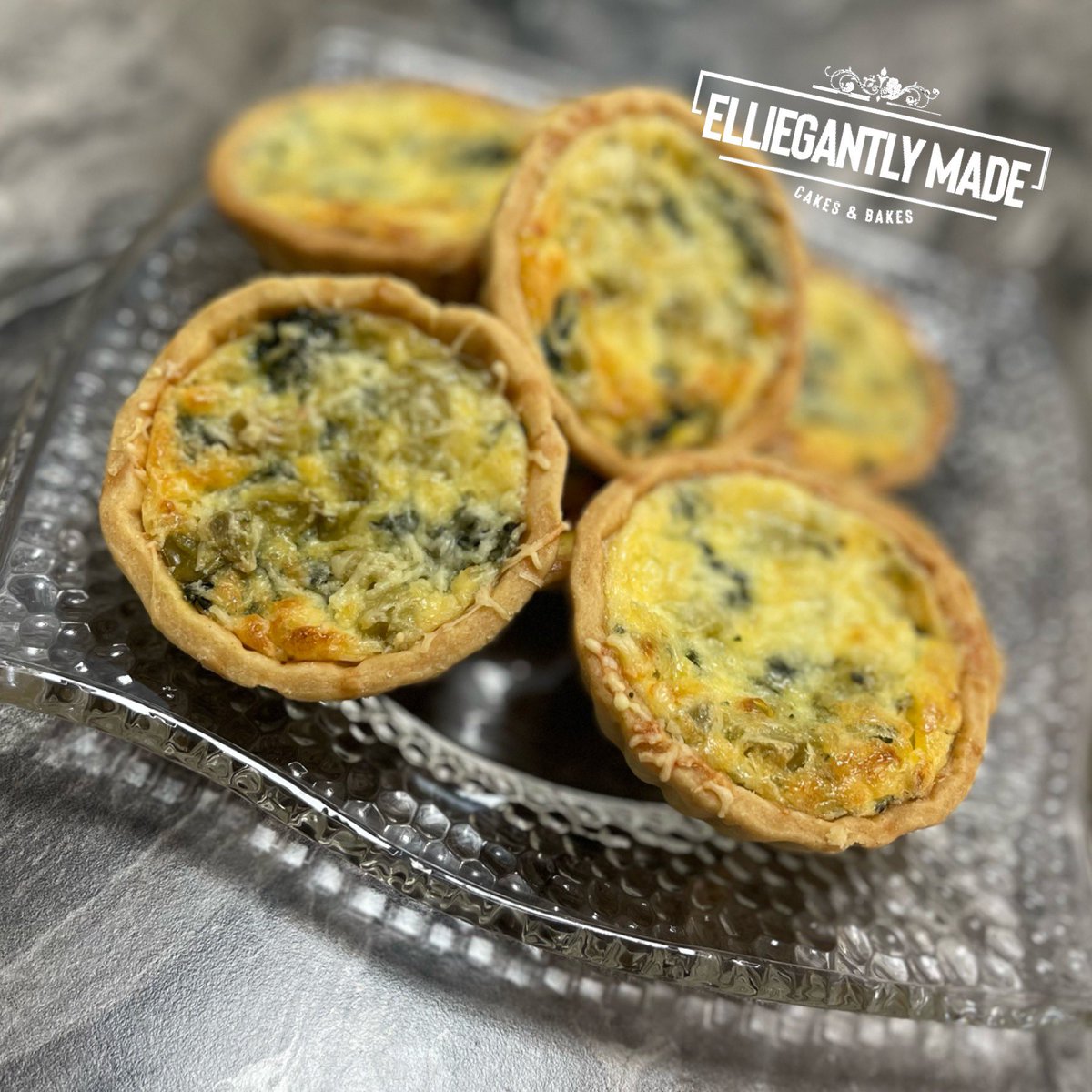 Elliegantlymade's tweet photo. Yesterday we had our ovens on doing product development for next weekends coronation platters. 
How incredible do these mini Kings Quiches look… and they taste incredible🤤 😋 
We are still taking orders for Saturday 6th and Sunday 7th and would love to hear from you 🎂💜🌈 https://t.co/gncipmJNzc