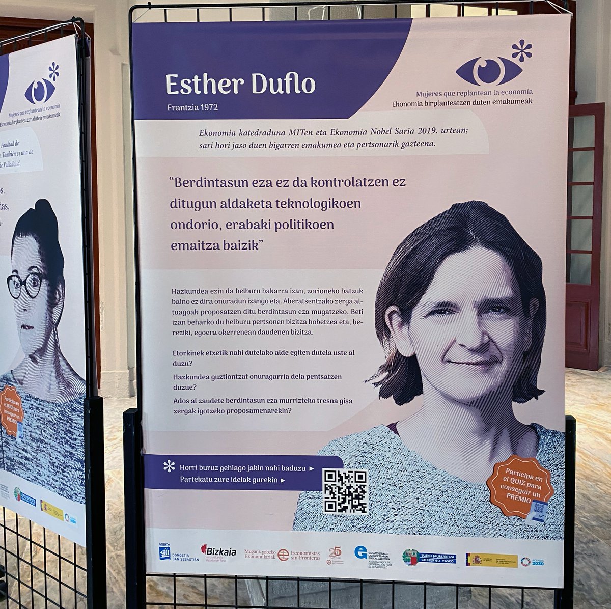 orkestra's tweet photo. Desde hace unos días, en @deustoDBS Bilbao podemos disfrutar de la exposición “Mujeres que replantean la economía” de @EconomiaJusta.
En la imagen podéis ver el poster de Esther Duflo, de la que ya nos habló en el blog @karmetxu con motivo del #8M👉https://t.co/pYzNeorOuY #MQRE https://t.co/v59er4Ldlz