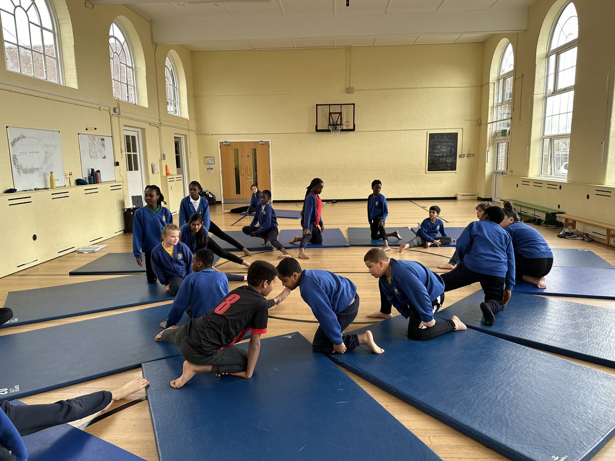 STOCSch's tweet photo. 6A are working up a real sweat! 😅! During their gymnastics lesson they were perfecting the side roll! Well done 6A 💛💙 @STOCSch @MertonSSP #gymnastics #sideroll https://t.co/wlhmAIg4IA