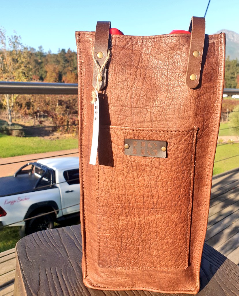 We have beautiful wine bags from 'Hey Suga Leather Products' in stock on the farm. Order now on admin@laboucherwines.co.za for only R585 each or get one free with a purchase of wine over R4500. 🍷