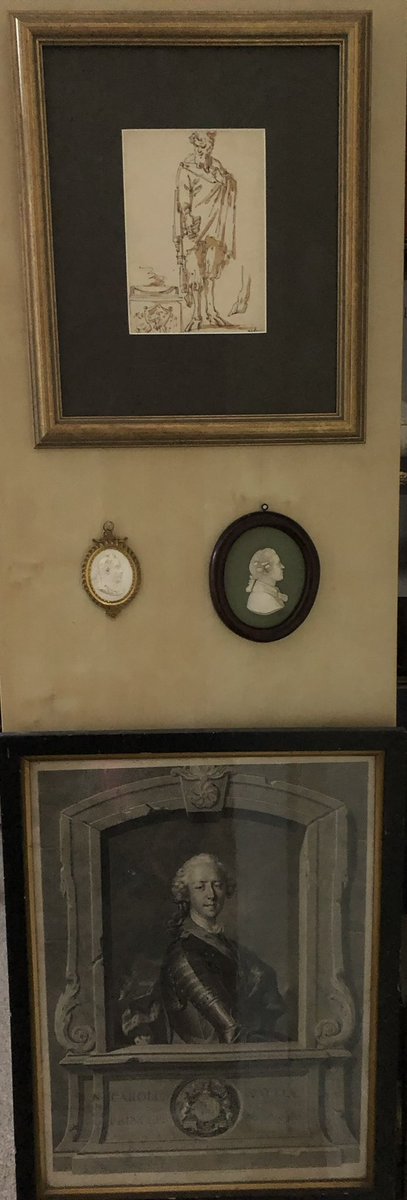 whitegoldsword's tweet photo. A diverse collection of #antiques on the side of my IKEA bookcase. An original drawing of #Pan by #SebastianoRicci c. 1730; Wedgwood biscuit #terracotta of the #RomanEmperor #Gallienus c. 1773; #Wedgwood plaque of #SirJoshuaReynolds c. 1800; engraving c.1740 #CharlesEdwardStuart https://t.co/7loZPyUmhG