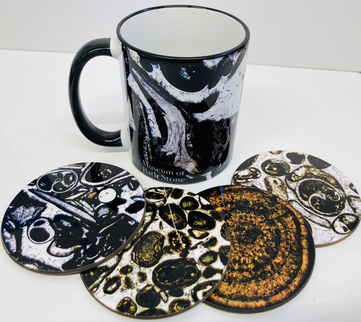 MuseumBathStone's tweet photo. Introducing a brand-new range… The Oolite Collection, available from the museum’s Giftshop 😍 developed using thin sections of bath stone, photographed under the microscope. Mugs £8, four-piece coaster sets £10. Exclusive to the @MuseumBathStone https://t.co/ZSZqEAvW4o
