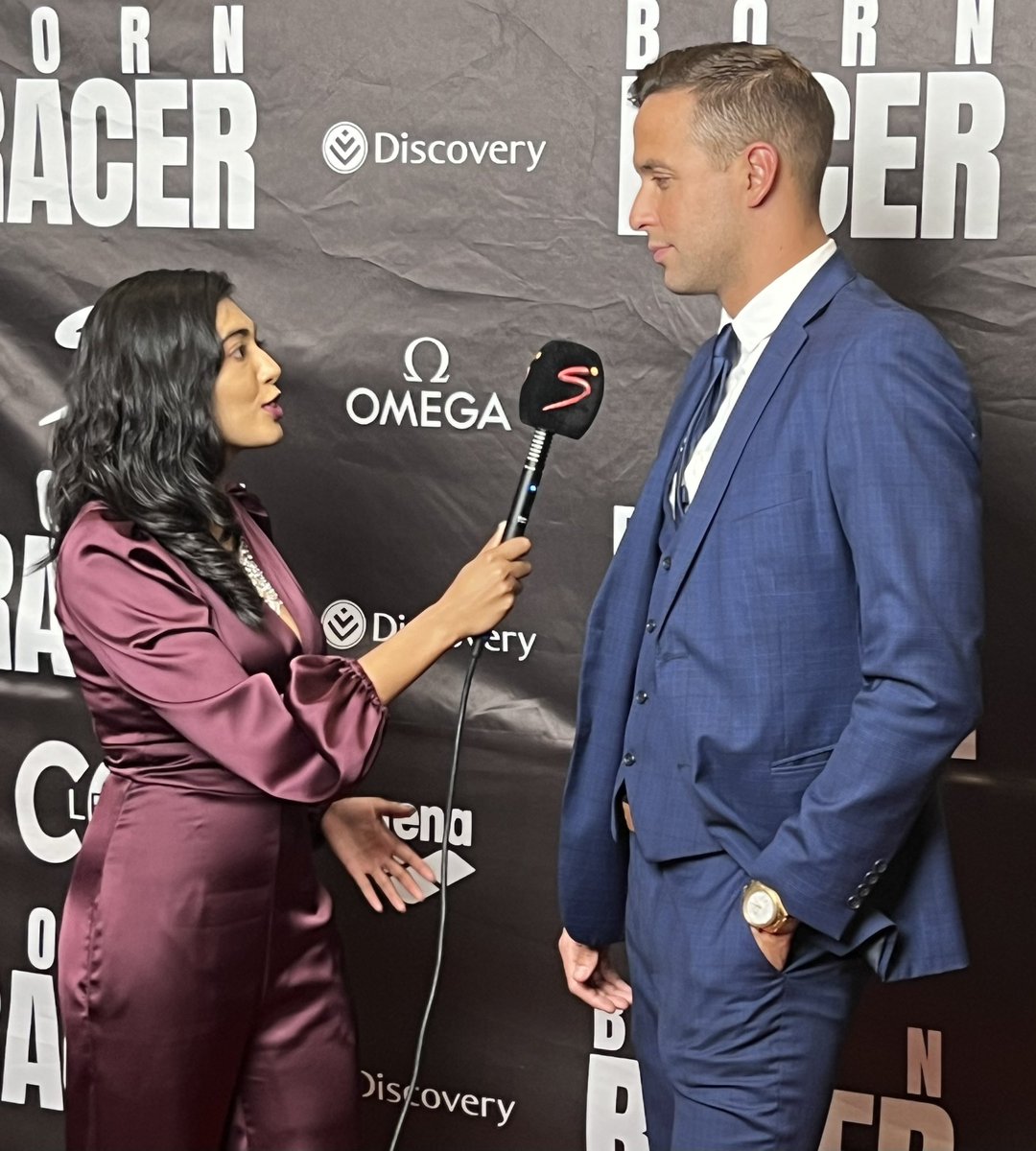 SunbetSA's tweet photo. A warm welcome to the man of the hour, @chadleclos, live from The Maslow Sandton at the exclusive Born Racer red carpet event. Hospitality proudly brought to you by SunBet. #SunBetExperience #BornRacer https://t.co/ibX3WtE2Vd