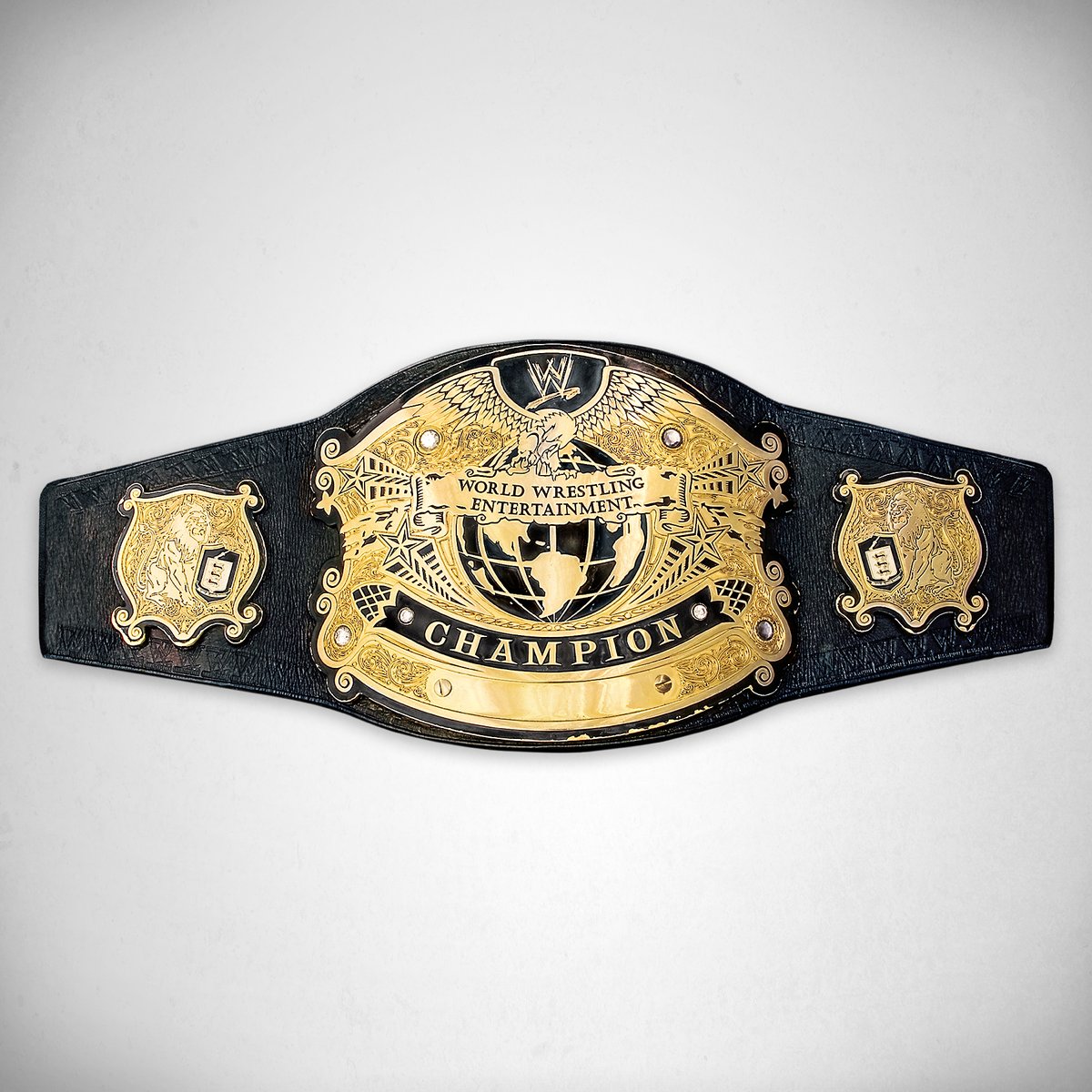 Who first comes to mind when you see this WWE Championship?