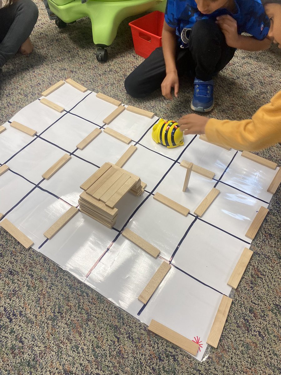 MrsGoldSTEAM's tweet photo. 1st graders using collaborative teamwork to engineer mazes and tunnels for their Bee Bots to travel through! #Robotics #Programming @RvilleProud @bitsbyBoomer https://t.co/uedxN91RTH
