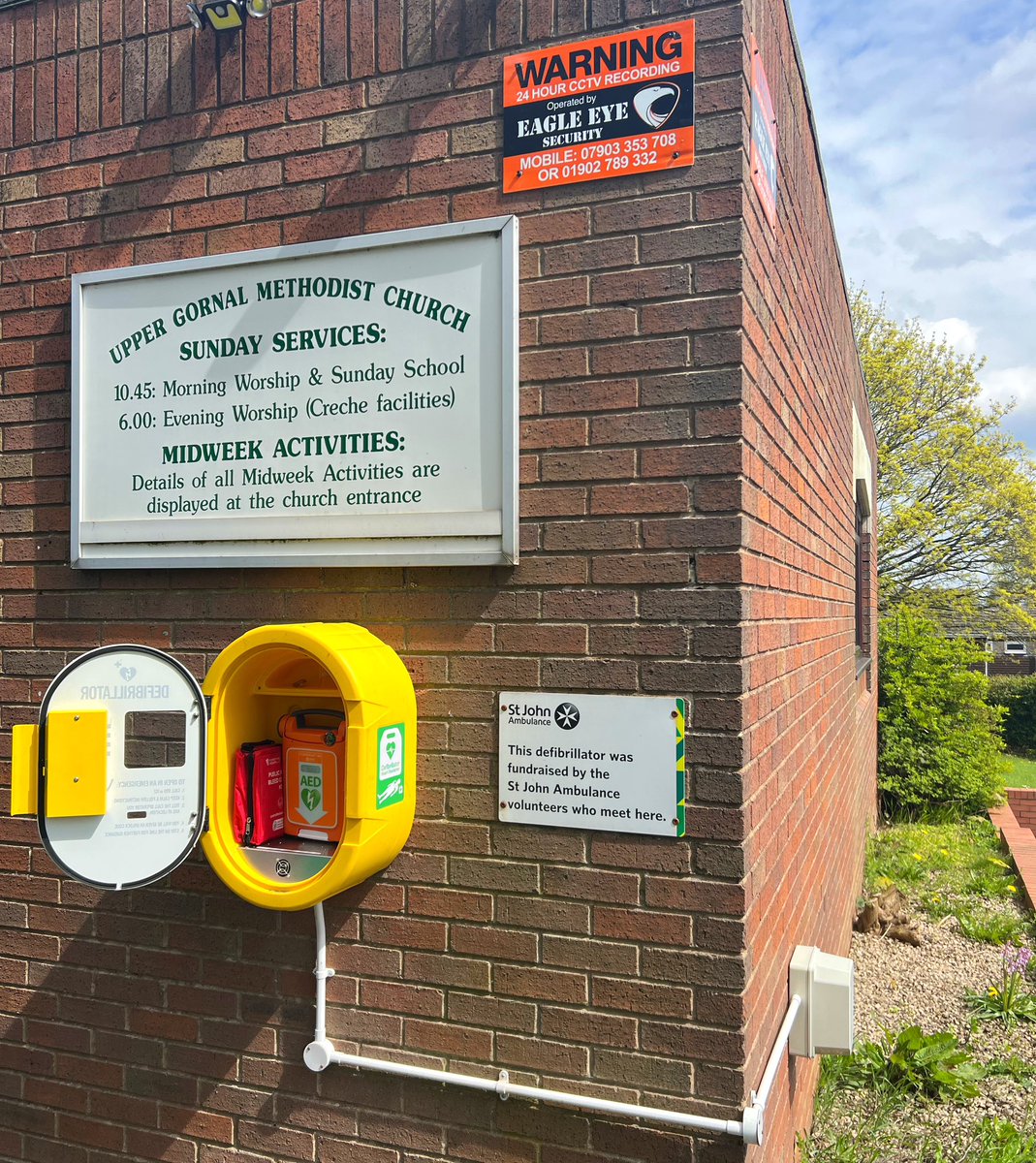 cllr_aston's tweet photo. Not all heroes wear capes … some arrive in a van!

The heartfelt thanks of @stjohnambulance to Carl &amp; Lee, Directors of @EagleSecuri2 who alongside @JMCsecure, have donated &amp; installed a full CCTV security system to monitor and protect our community defibrillator and bleed kit. https://t.co/y1Yb5HoIGQ