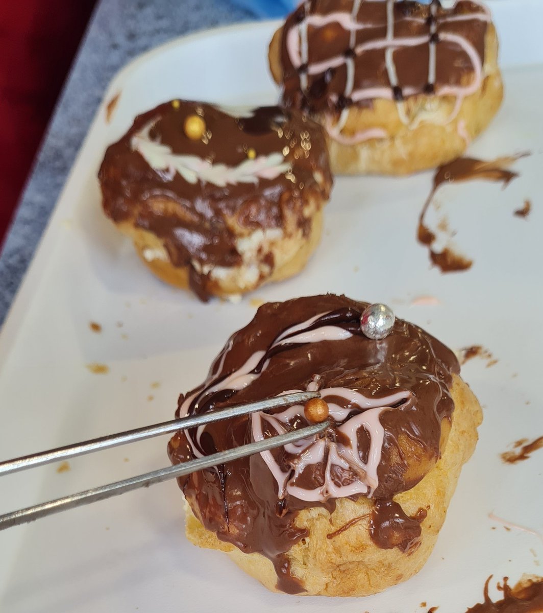 LyndonFood's tweet photo. Year 9 achieving a high level of skilled  work on their choux buns using their artistic flair.  Well done all of you, very proud of your high level of skills you have achieved since year 7 👏 @LyndonSchool @Summit_LT @LyndonCareers https://t.co/LAXLKW9ZKW