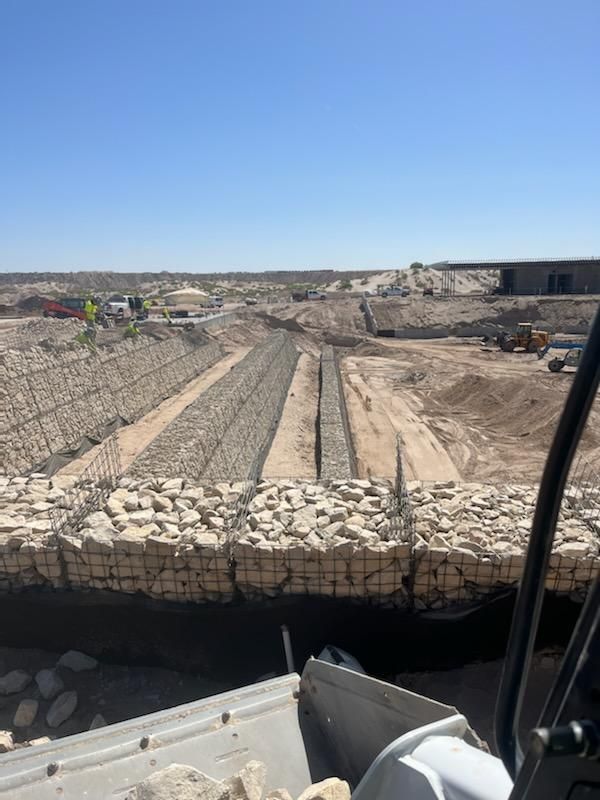 StructuresBuild's tweet photo. Hard work, hand placed rock, and heat! Our teams are in El Paso, Texas installing gabion basket walls!
Check out the progress at Socorro Activities Complex!
#retainingexcellenceandpavingtheway
#retainingwalls https://t.co/1DMx9hggqN