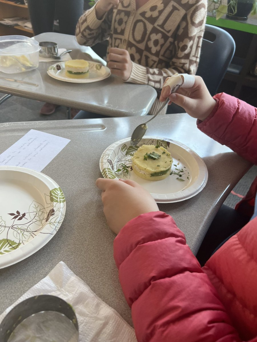 Profe Ridge from Heath and Chef Otto from Lima Limón helping Brookline students sample empanadas and make causa from Perú for our Comida Callejera (street food) unit!