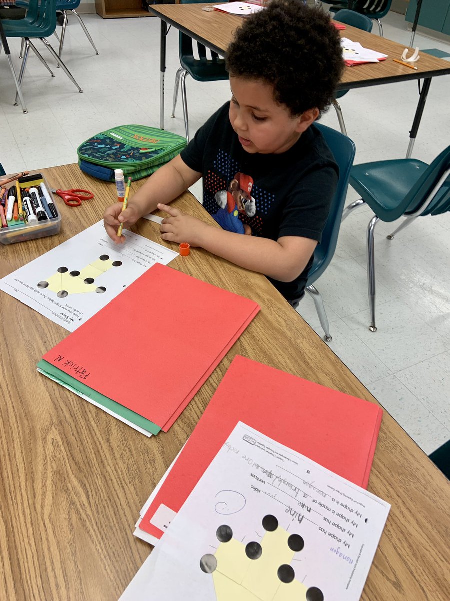 Mrs_Brazier's tweet photo. My 1st grade student mathematicians composed new shapes from 2-4 smaller shapes. Each student identified the name of the new shape, the number of sides, and the number of vertices.@CPES_Cheetahs @PWCSGiftedEd https://t.co/KcD9ZEg8CM