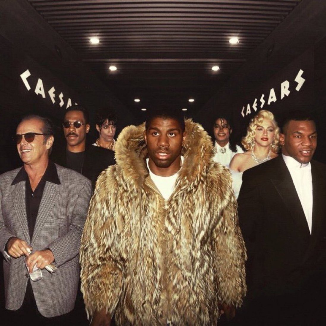 Hoopss's tweet photo. Magic Johnson and his celebrity crew walking into the playoffs..

Coldest photo of all-time! https://t.co/IRCnNw7sLA