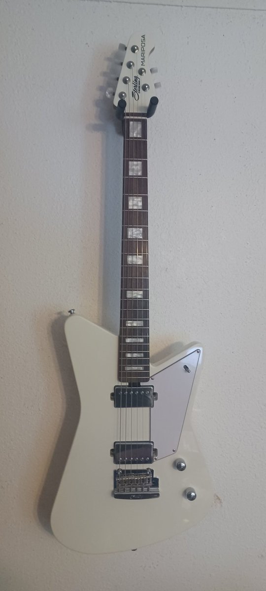 tporter64's tweet photo. Wife got me some guitars recently. An Ibanez Artcore hollow body and an Ernie Ball Mariposa. They are really fun to play, and look kinda neat. What more do you want? 😀 https://t.co/EznSAy6KWY