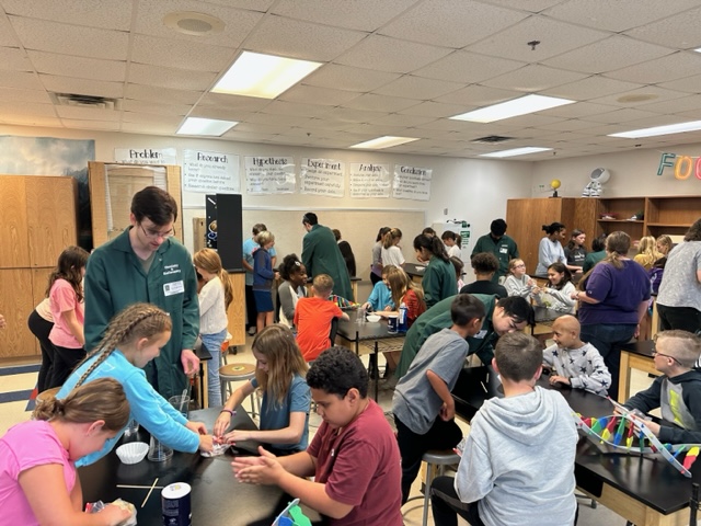 Trakselis's tweet photo. #Traklab celebrated #DNADay23 with outreach to local elementary schools extracting DNA from various fruits! So much fun and energy with these 5th graders. @WoodwayElem #outreach @NSF #Broaderimpacts #futurescientists https://t.co/OvrK5Q5xqp