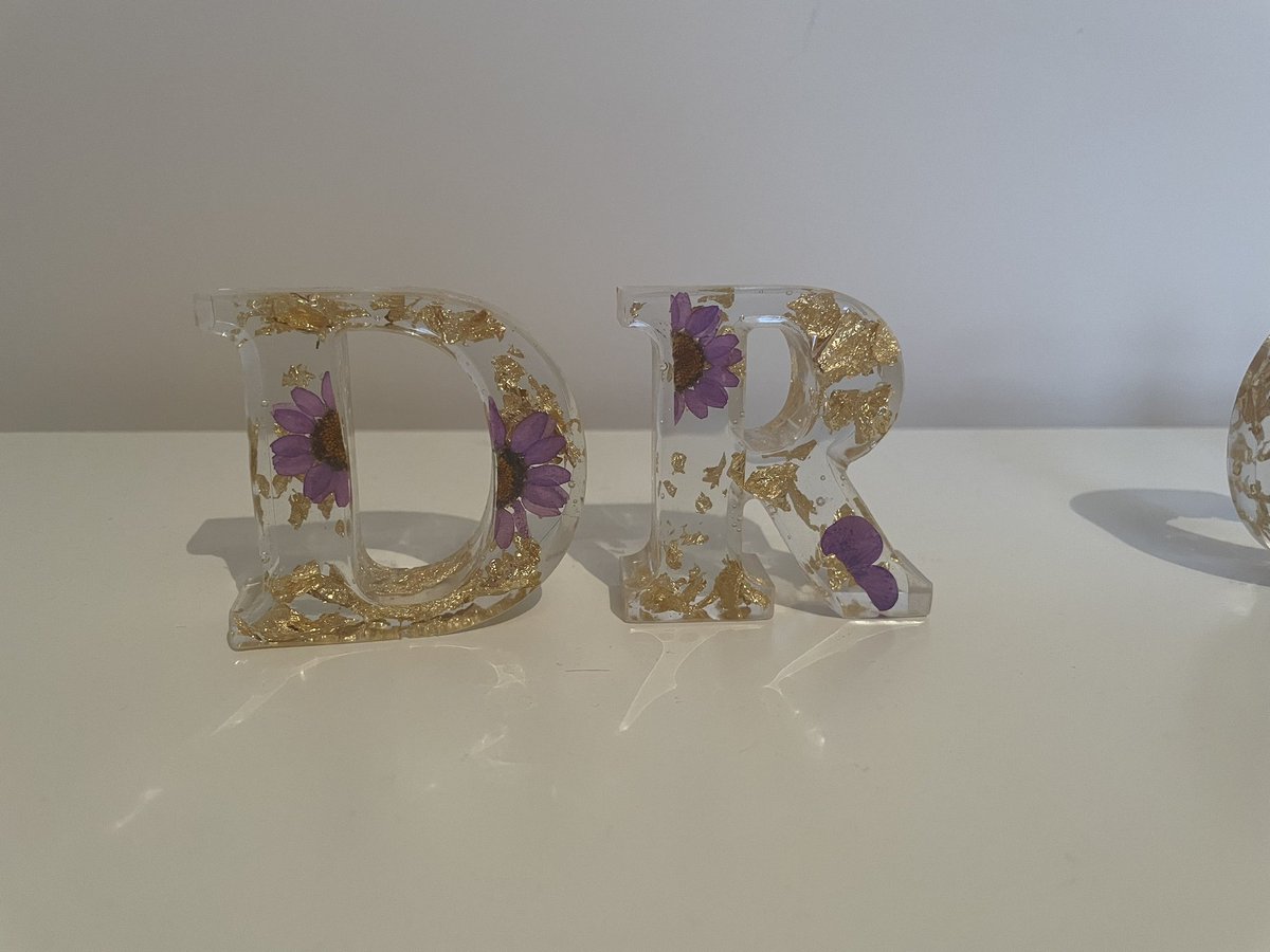 Celie's tweet photo. I wanted a name plaque that says ‘Dr Celia Hulme’ but I could not find what I wanted. So I decided to go for freestanding individual resin letters.  I chose purple to represent the University of Manchester colours. 

Something different! https://t.co/WhskOcjIA3