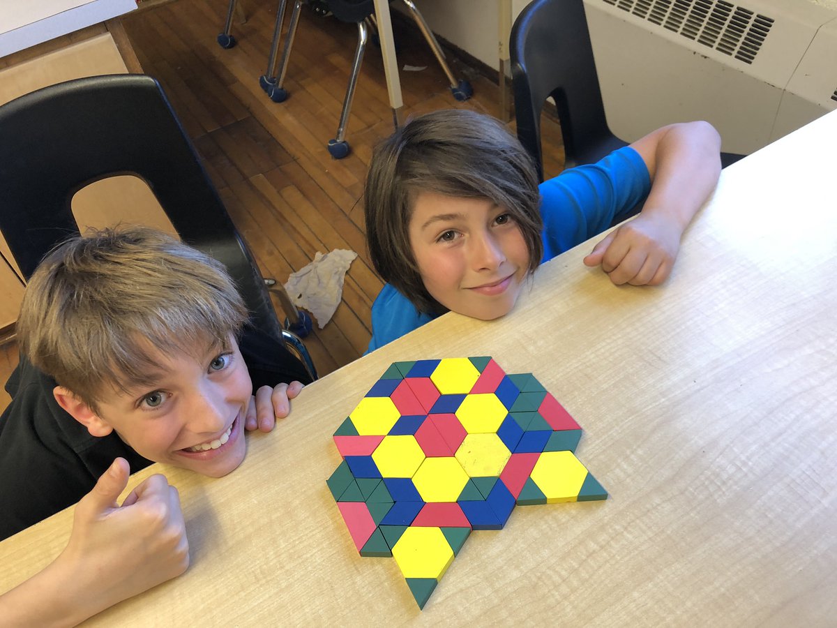 MrKSDyck's tweet photo. Grade 5/6s @PortWellerPS recently were tasked with creating four different #PatternBlocks designs, each with a different amount of #Symmetry lines: ONLY 1, 2, 3, &amp; 4 lines of symmetry. There were a lot of ohs &amp; modifications! #Reflections #Math #Transformations #LinesOfReflection https://t.co/XYFPSTaoek