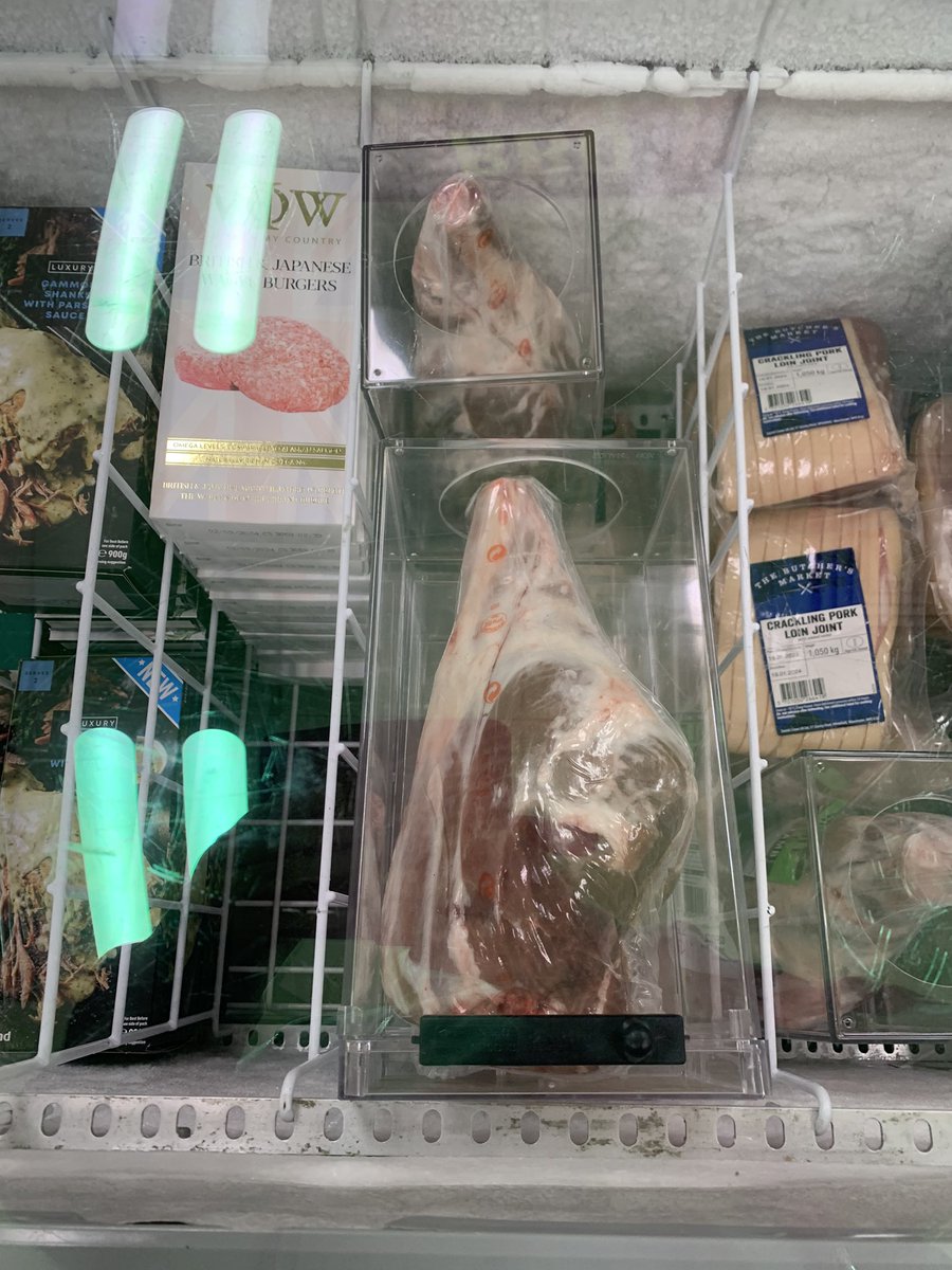 ComicsRose's tweet photo. If this isn’t the cost of living crisis I don’t know what is! 

For reference that is a leg of lamb in the freezer with a security lock box around it 😂 https://t.co/MFdcsa0Sti