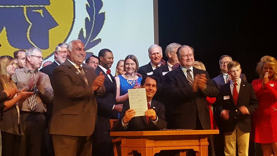 AHAWisconsin's tweet photo. THROWBACK WEDNESDAY: Seven years ago today, April 26, 2016, Governor Scott Walker signed the CPR in Schools Bill ensuring all Wisconsin students are trained in CPR before they graduate from high school. #CPRWisconsin https://t.co/xZpEtX3IEW