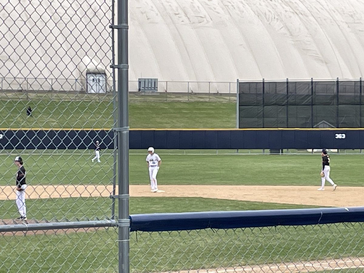 Irish ☘️ Caden Hegarty drives one to the fence.  Irish ☘️ up 6-0 against Farmington.