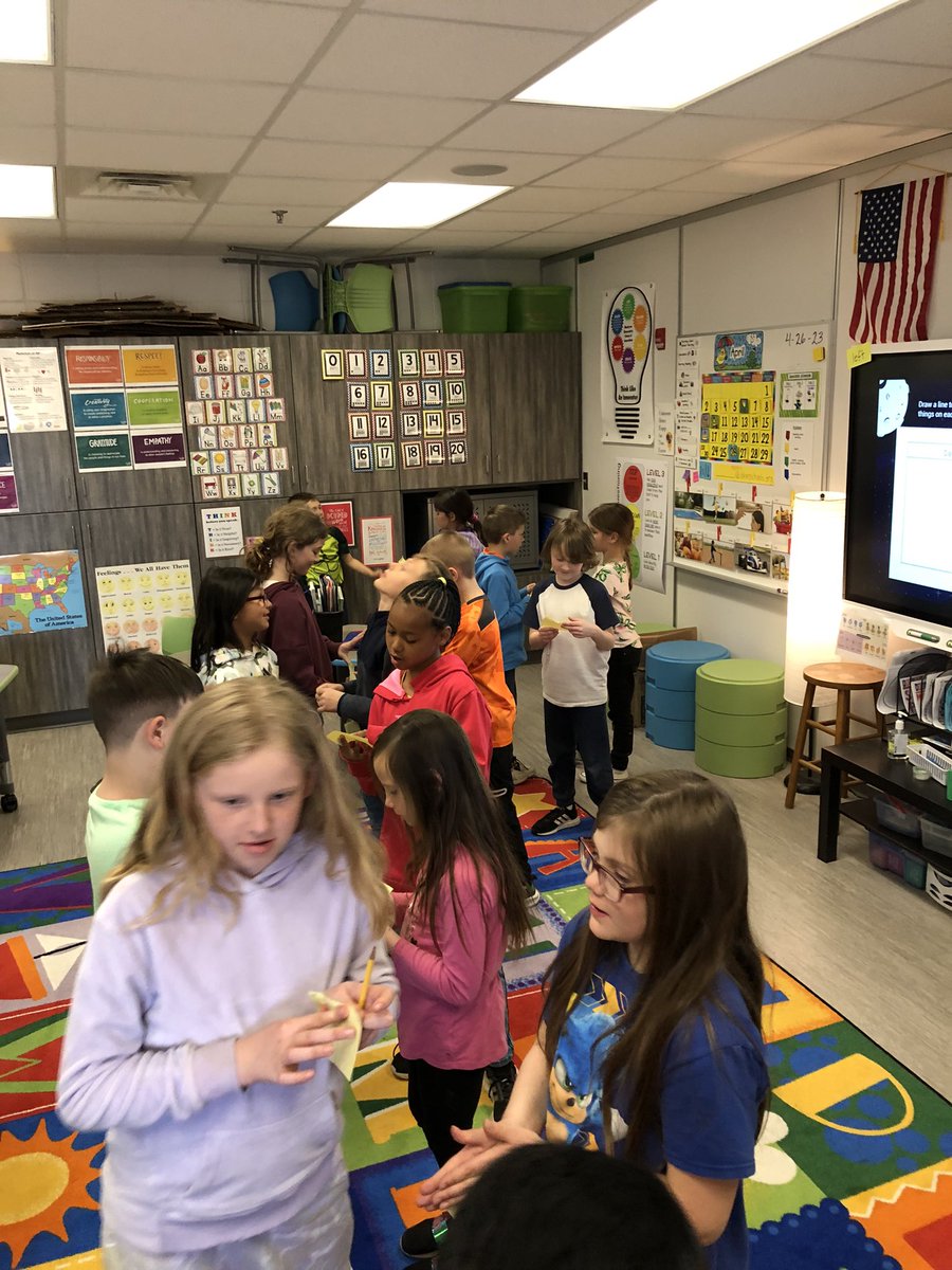 Discussing prior knowledge with a partner in a crooked conga line #theMESway #AVIDatMESI
