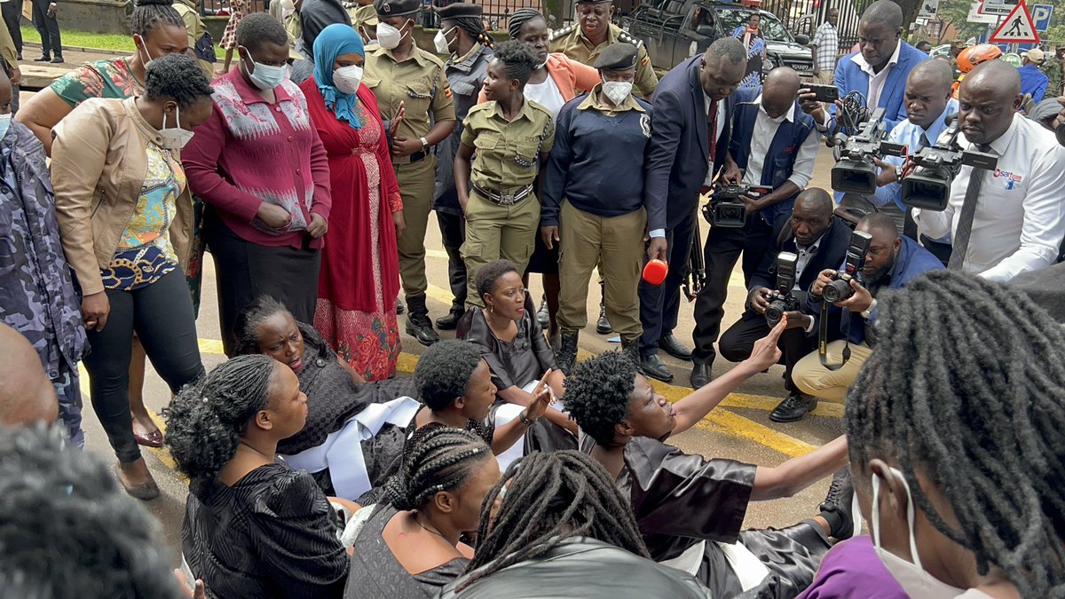 MathiasMpuuga's tweet photo. The Police have rounded up our female MPs outside Parliament’s main gate as they marched towards Ministry of Internal Affairs in protest agst the brutality of security agencies. https://t.co/QW9QW1XTak