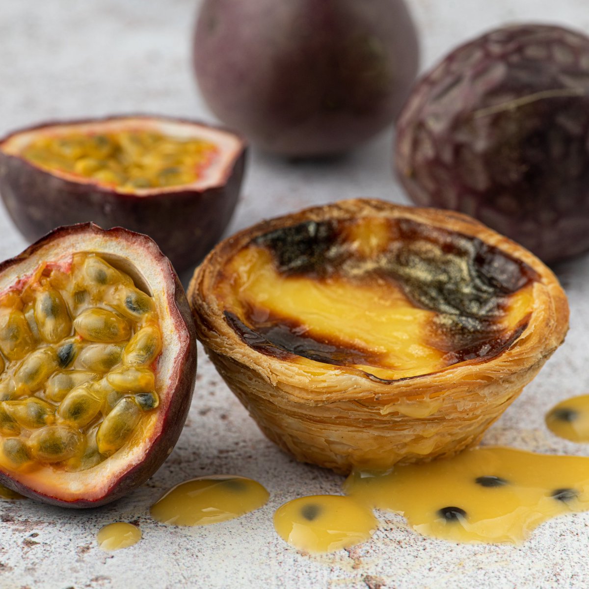 Transport your taste buds to a tropical paradise ☀️🏖️ with our passion fruit Pastel de Nata - freshly baked with only the finest ingredients for a delicious explosion of exotic summer flavors! #passionata 

Visit in stores or order online (link in bio)

#pasteldenata #cafedenata