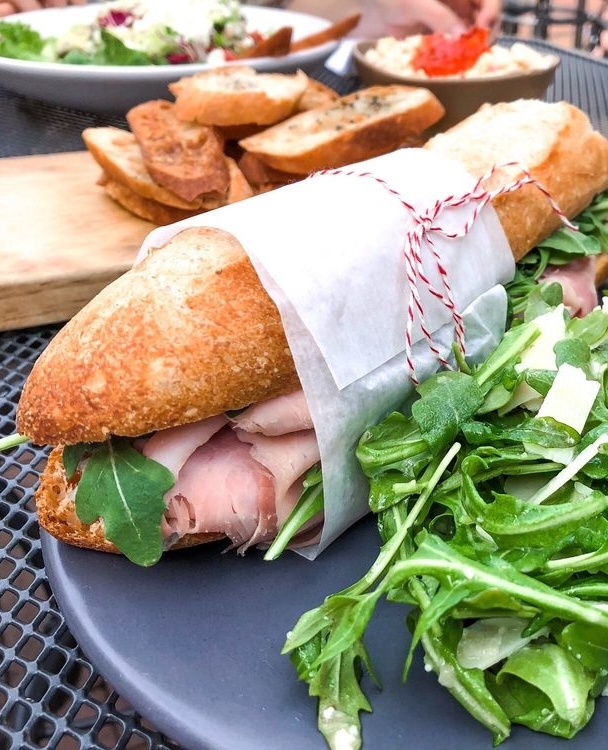 Let’s toast to the art of the sandwich and the endless possibilities you can create between two slices of bread 🥪 If you need us, we’ll be celebrating the ultimate handheld meal at @tilmanscheeseandwine with their classic French baguette sandwich.