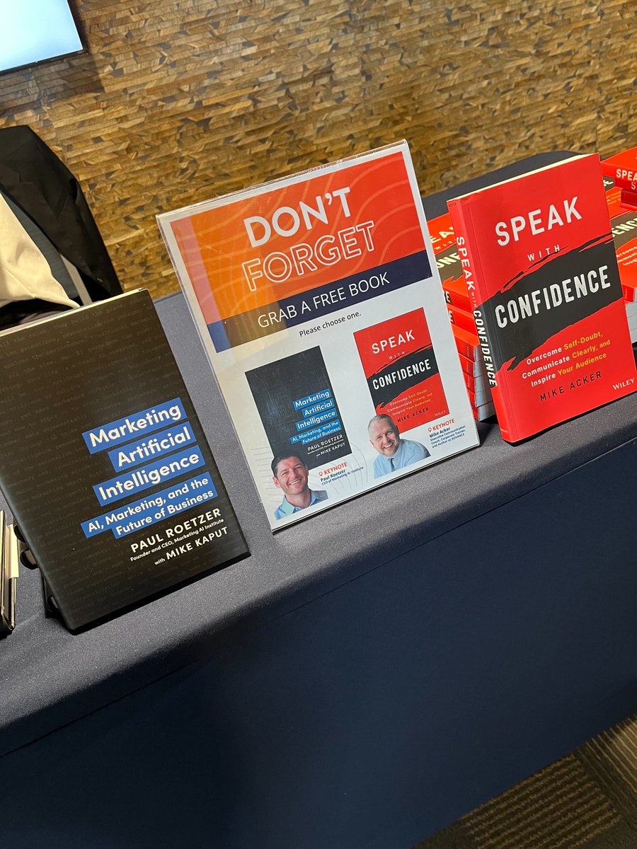 ExpInbound's tweet photo. Did you remember to grab a free book? You have the option between @mikeackerdotcom's Speak with Confidence and @paulroetzer's Marketing Artificial Intelligence. You can't go wrong with either! #ExpInbound https://t.co/XQM2urkixg