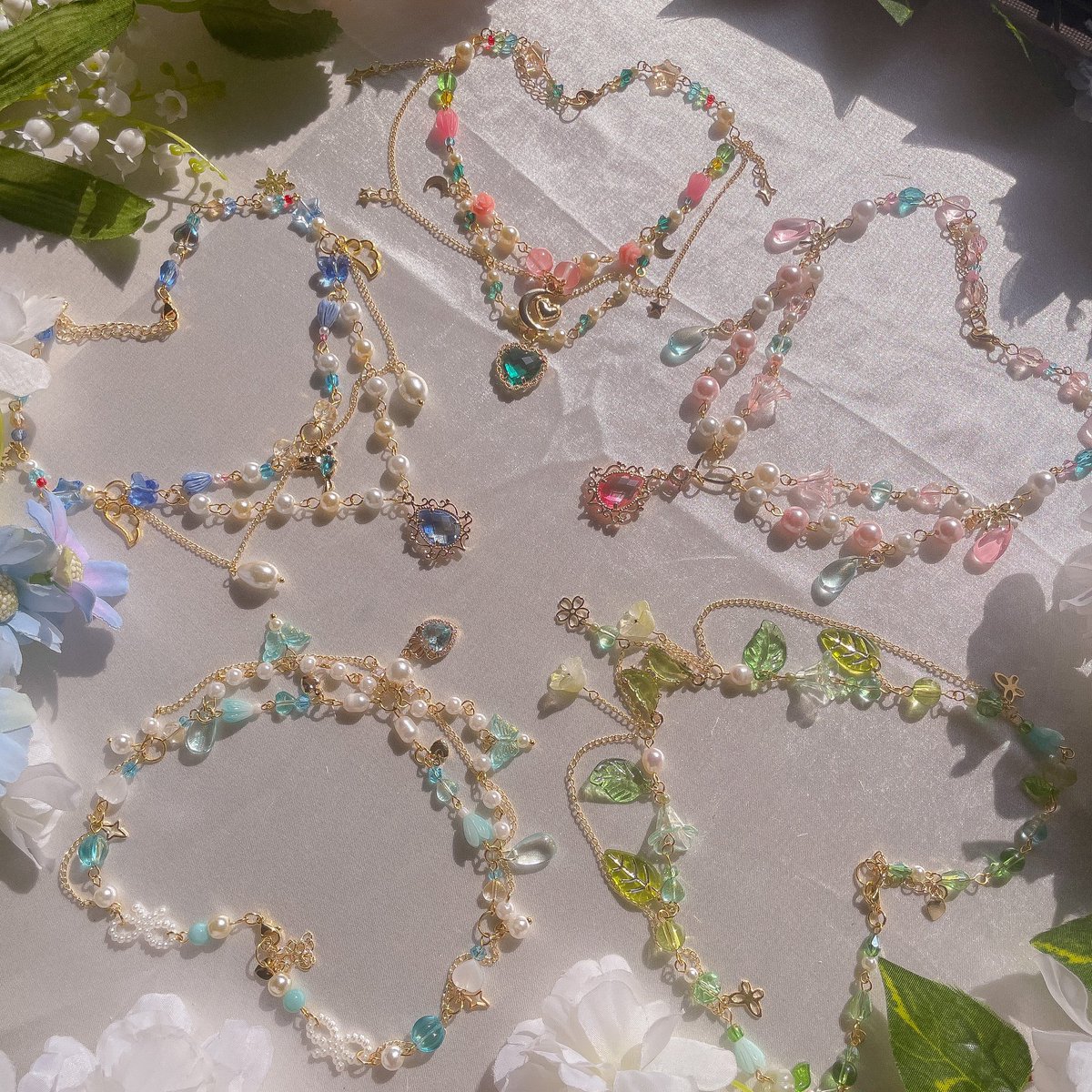 loafsie's tweet photo. ʚ 🌿 ɞ ⋯  ❛ the hyrule collection ❜ ⚔️🌲✨

⋯ ft. brand new LIMITED EDITION necklace and earring designs inspired by the legend of zelda breath of the wild and tears of the kingdom ♡

𓏲 avail for intl/local pre orders this may 05, 2023  *ੈ✩‧₊˚ https://t.co/Xfw2w4LyKG