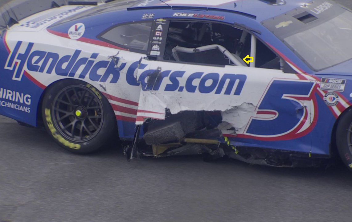 Twisted_Toe's tweet photo. I was looking at this closer, and that doesn't look like just the top door bar, the second row is in that far as well... It looks like the entire door cage snapped at the B post and caved in nearly to the driver's seat. Larson said his cockpit was completely destroyed https://t.co/wNtZGG7Ino