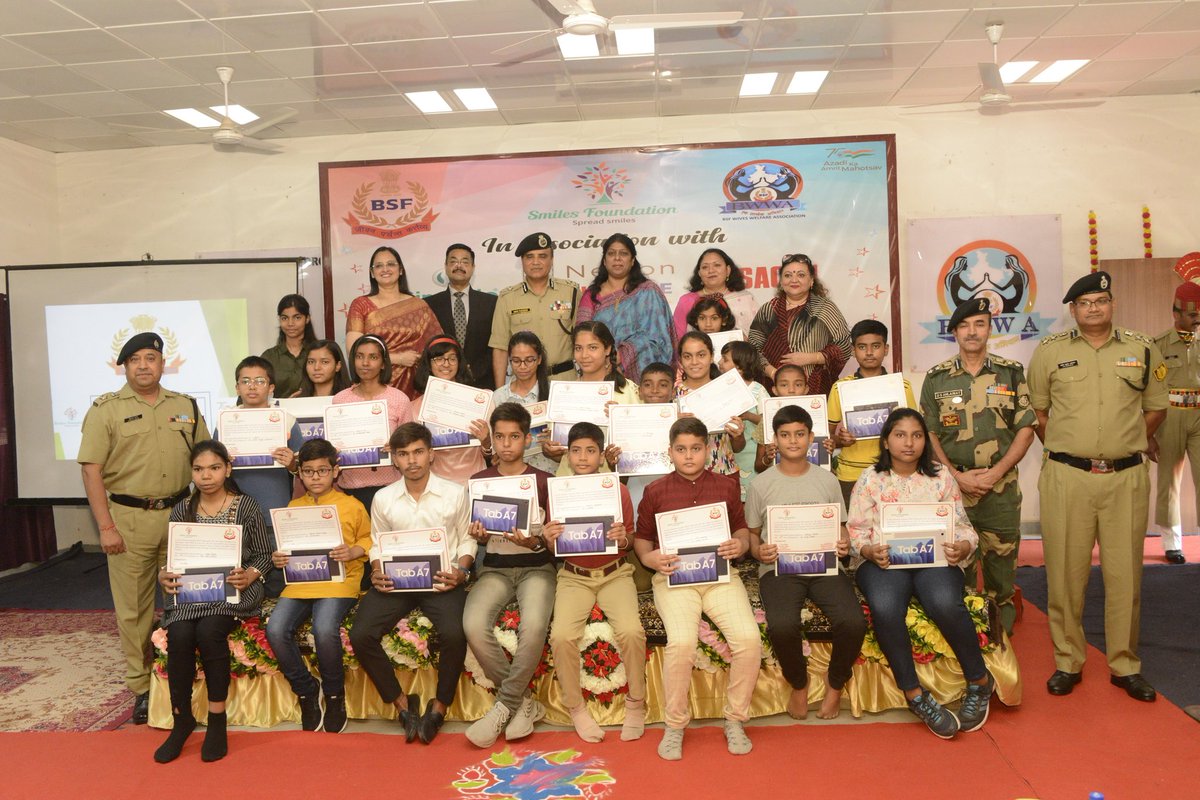 BSF_Gujarat's tweet photo. Dr Prema Gandhi, BWWA President, Gujarat Frontier and Sh Ravi Gandhi, IG BSF Gujarat Frontier, along with Smt Uma Ahuja, Founder and President, Smiles Foundation, handed over tablets and certificates to 50 deserving children.
#EducationForAll #BetterFuture
@SmilesFn @BWWA_India https://t.co/aQ23a6DcJb