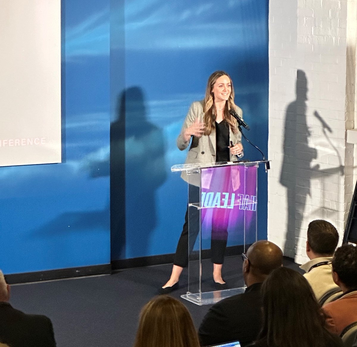 IHAForum's tweet photo. A warm welcome, from our dedicated director—IHAF’s Emily Foster steps up to the mic to review a packed agenda and introduce our first keynote. #inhouseagency #IHAFconference https://t.co/6DWaeI5OpU