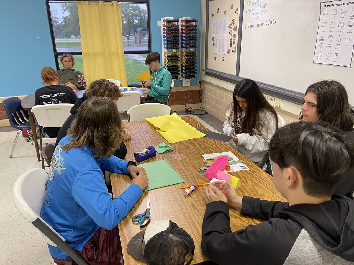 1st period Geometry doing a hands on project to calculate volume and surface area of their “mini city scape”