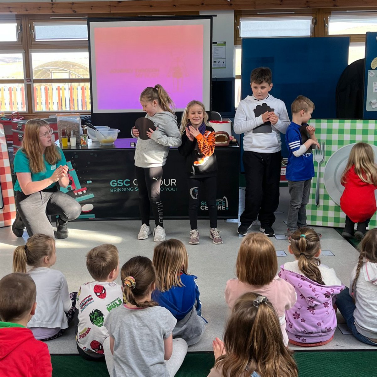 gsc1's tweet photo. #GSCOnTour update
Ross & Megan's tour of Unst & Whalsay schools continues. Today, wowing pupils at Baltasound Primary with “Journey Through My Body”
The children were delighted & disgusted as Megan revealed a stomach full of food & let them act as muscles to digest the food. https://t.co/tOS6jwcWER